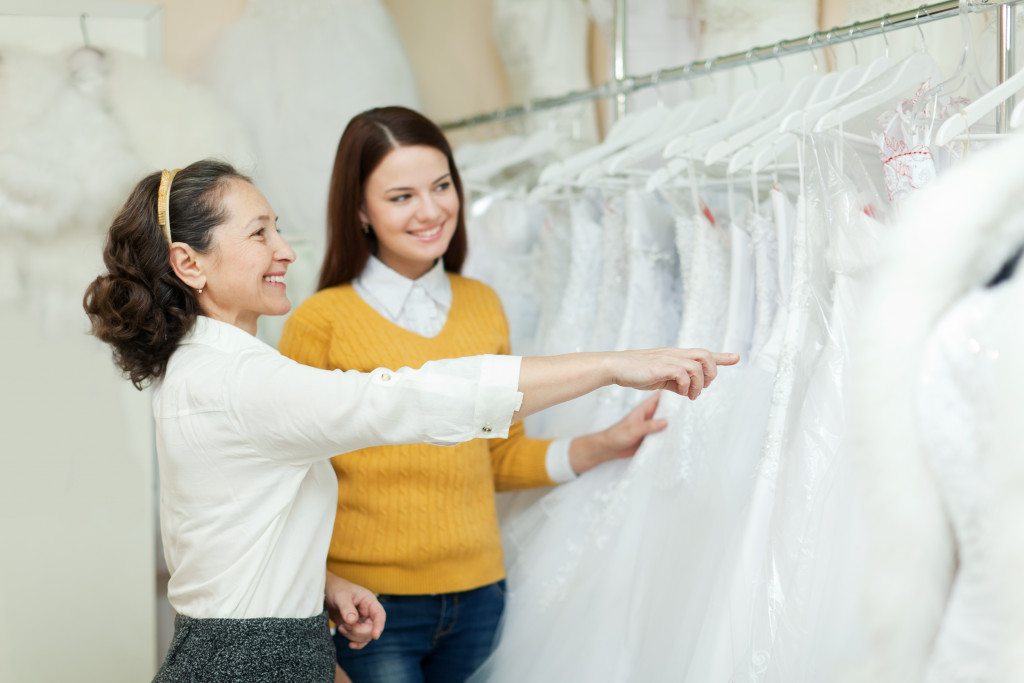 bride to be choosing her wedding dress