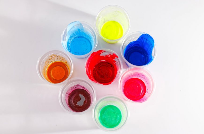 Colorful Paints in the Plastic Cups